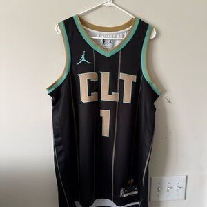 NBA Black and Gold Jersey with Teal Accents